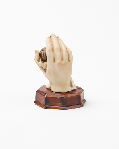 Mano de Dios con angelito